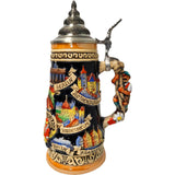 Side of a King Beer Stein with famous buildings of Berlin, Rothenburg, Duesseldorf and Munich with a mountain climber who seems to climb up the handle.