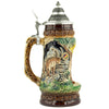 Side of a KING Beer Stein with an ibex standing attentively in his environment. The brown and green tones of the Mug underline the nature scenes.
