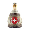 King Beer stein painted in shades of brown with the Swiss Crest on the front. On top of the pewter lid is a St. Bernard with a barrel around his neck. 