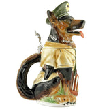 Beer Stein in the shape of a police dog. The shepherd dog wears a typical green German police uniform and holds a stack of books in his paw. In the side view you can see that he has a pistol on his belt
