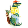Side view of a king beer stein in form of a golfing alligator dressed with a typical golfer outfit. He wears a red cap, mirrored sunglasses and a gold watch. With a cigar in his mouth he is focused on the target and ready to tee off. The handle is in the shape of a golf bag