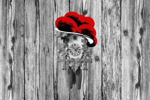 Traditional Cuckoo Clock with Black Forest Bollenhut on Wood