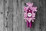 Traditional Cuckoo Clock with Purple Icing on Wood