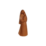 Stylized wooden statue of the Virgin Mary, standing and looking over the baby Jesus cradled in her arms.