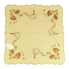 Square sand color tablecloth, with a border of hedgehogs with apples in each corner, and trees blowing autumn leaves in the wind on either side.