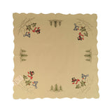 Square white tablecloth with a pair of snowmen in each corner carrying a Christmas tree, bordered by forest trees on either side of them.