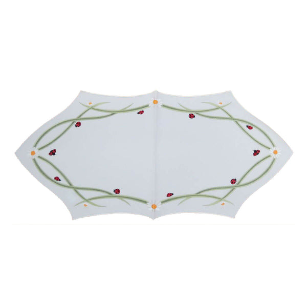 White pointed oval table linen, with a border of ladybugs, daisies, and stems.