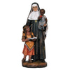 Hand-carved wood figurine of Saint Katharine Drexel standing in her nun's habit, with a Native American child by her side and an African American child in her arms.