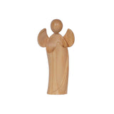 A wooden stylized winged angel, standing with its hands folded in prayer.