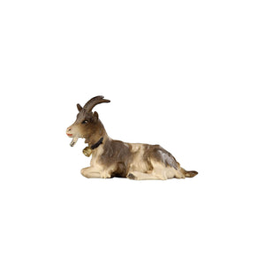 This PEMA Kostner Nativity lifelike goat is hand-carved and hand-painted. It is lying down and features intricate details such as horns, a collar with bell, a goatee and two-tone white and brown fur. The perfect accent for our holiday décor. 