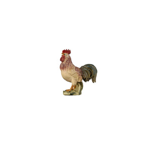 The standing rooster has a tan body with darker brown feathers on his neck and back. His comb and wattle are bright red. The bushy tail feathers are black. The rooster is standing on a wooden base.