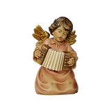Kneeling Angel playing an accordion. His golden wings match the pink dress with small golden stars.