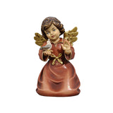 Kneeling Angel with bird perched on his hand. His golden wings match the golden bow of his pink dress.