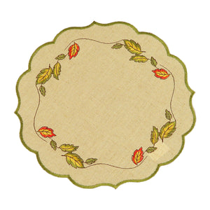 Round sand color table linen with green scalloped edges, and a border of fall leaves blowing in the wind.