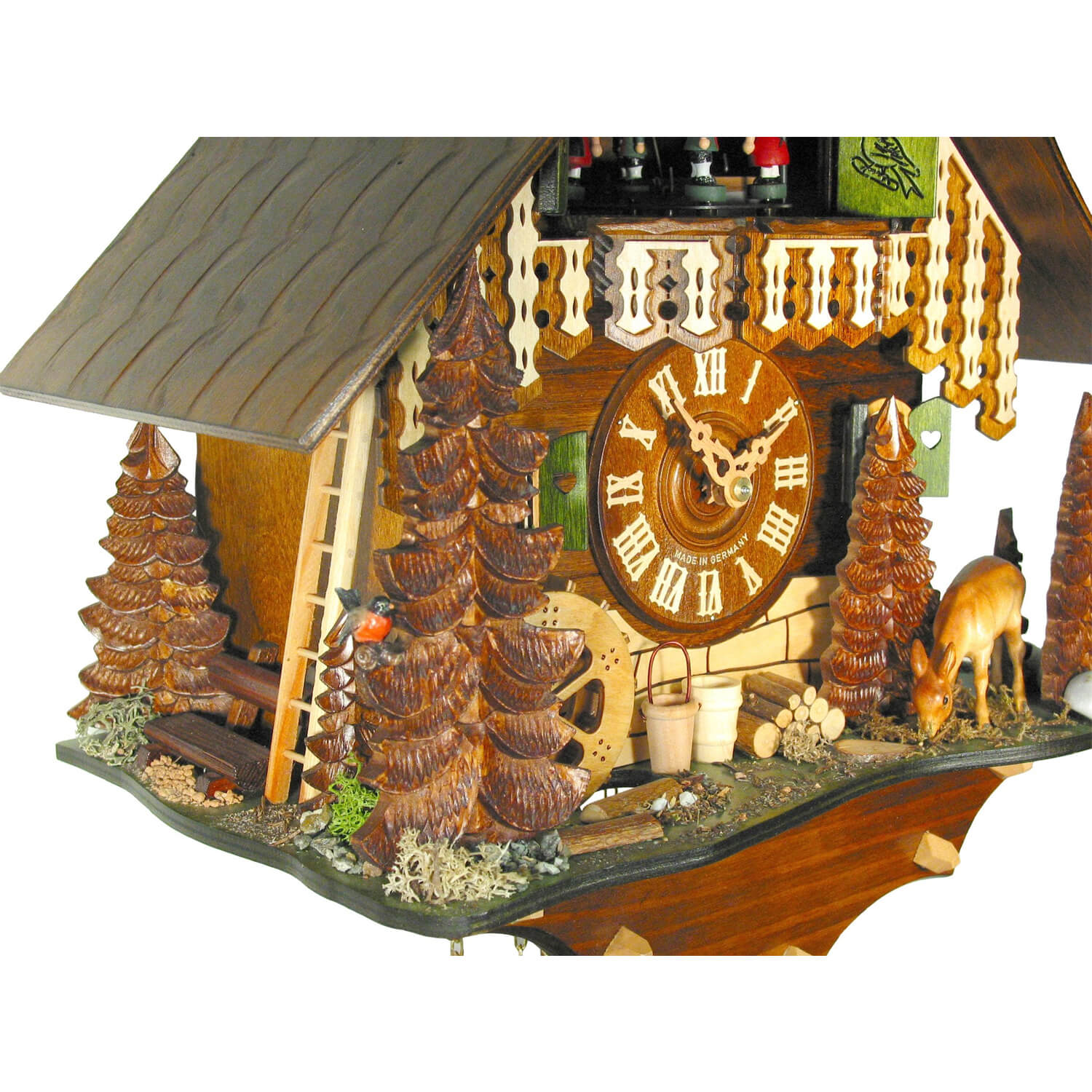 Side view of the Schwer 8 Day Clock with Music, Dancers, and Spinning Water Wheel.