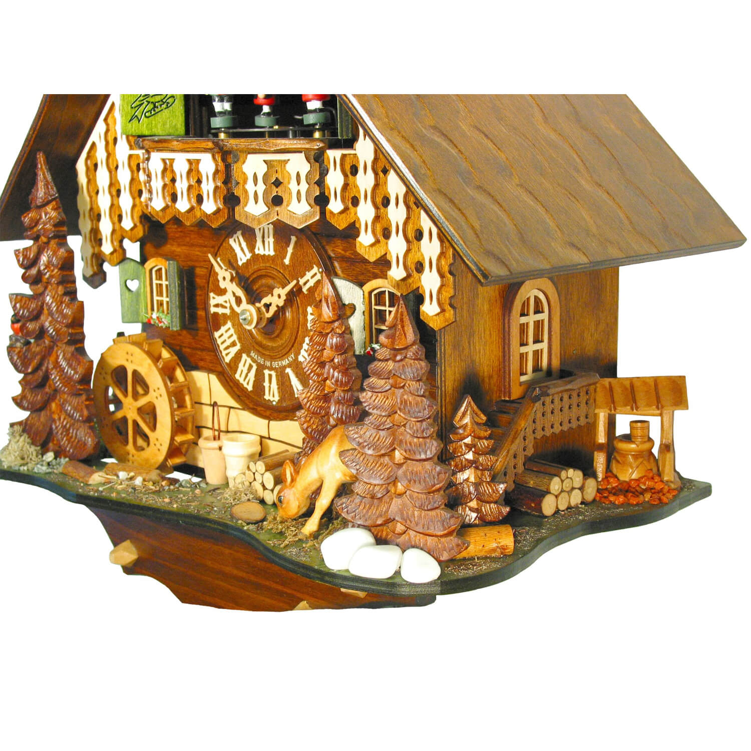 Side view of the Schwer 8 Day Clock with Music, Dancers, and Spinning Water Wheel.