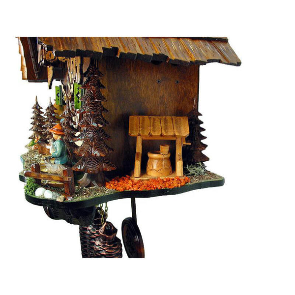 German Boy holding a Baby Goat next to a Wooden Well on an August Schwer Black forest Cuckoo Clock