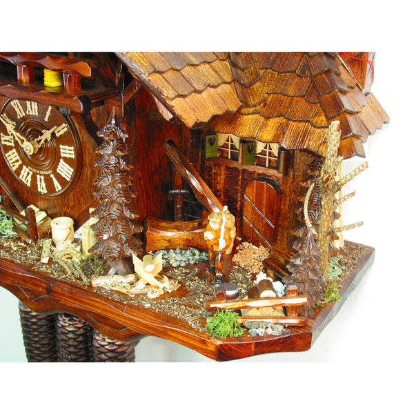 German Boy with his Lunch tied to a Stick next to a Well on an August Schwer Black Forest Cuckoo Clock