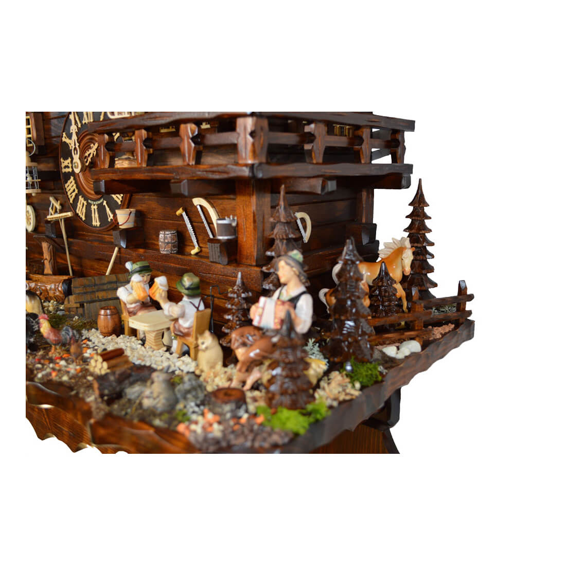 Zoomed in view of the right side of the clock featuring the horse, beer drinkers, and musician. 
