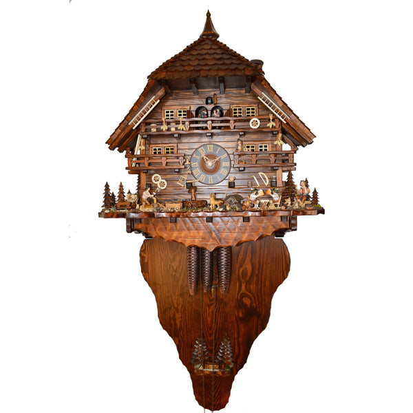 Schwer 8 Day clock, Featuring two beer drinkers, dancers, woodchoppers, and a farm style appearance.