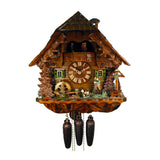 8-Day Chalet August Schwer Black Forest coocoo clock. The solid wood clock features a large tree on the left corner. Next to a fenced-in water wheel a hunter holding a rifle with his dog are looking at a bird on the balcony above. There is a bench underneath a wayside cross. On the right side of the woodsy cabin is a water pump and trough with trees. Windows with green shutters flank the dial. Dancers above spin on the balcony. The cuckoo bird comes out from his door above underneath the shingled roof.