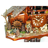 Black Forest Clock Peddler walking with Umbrella and Dog next to a Water Wheel on a Schwer Cuckoo Clock
