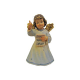 Sculpted wooden Sissi angel figurine in a blue dress with golden wings, conducting and holding a sheet of music in one hand.