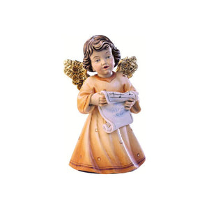 Sculpted wooden Sissi Angel figurine in an orange dress with golden wings, singing and holding a sheet music.