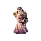 Sculpted wooden Sissi Angel figurine with golden wings in a pink dress, holding a teddy bear with a blue ribbon wrapped around it.