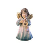 Sculpted wooden Sissi Angel figurine with golden wings in a blue dress, playing a trumpet with a banner wrapped around it.