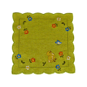 Square green table linen with scalloped edges, and a design of a baby chick and butterfly, with a border of spring flowers.