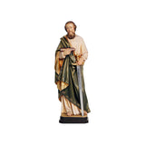 Sculpted wooden statue of St. Paul, dressed in flowing robes, holding a book in one hand, and a sword in the other.