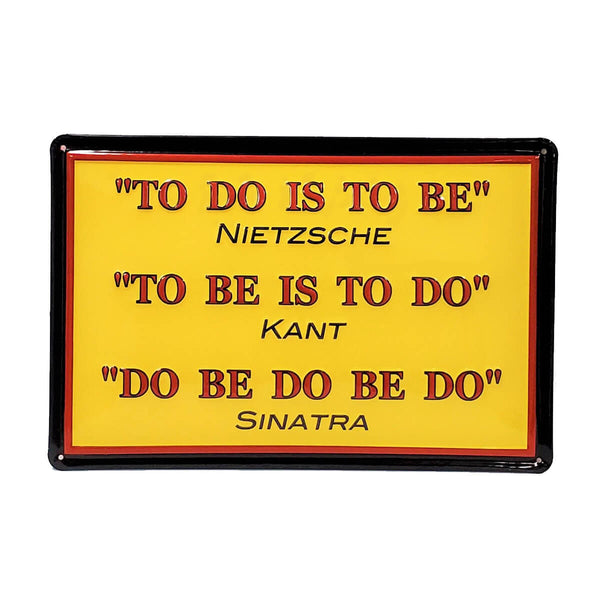 Decorative metal sign of a humorous take on the philosophies of Nietzsche, Kant, and Sinatra.