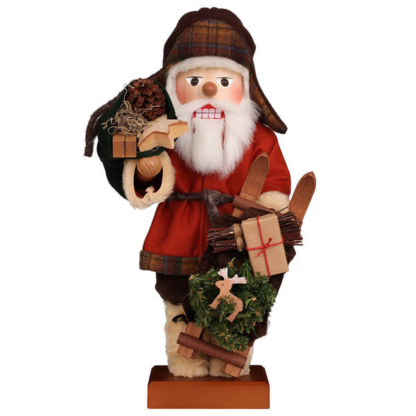 Ulbricht Swedish Sami Santa Nutcracker in his red coat, earflap hat and decorated sleigh in hand he is on his way to bring presents to the children.