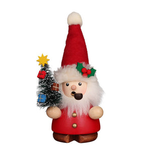 Christian Ulbricht Red Santa Smoker (Incense Burner). He wears a red coat and a red pointed hat in his hand he holds a decorated Christmas tree with colorful gifts and a shining yellow star on the top