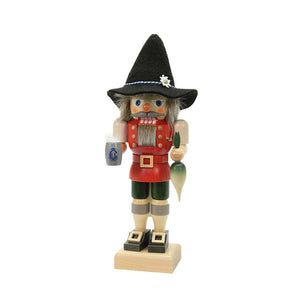 This proud Bavarian Nutcracker by Christian Ulbricht is holding his blue and grey beer stein and a traditional Bavarian snack, a tasty radish