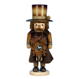 This hand carved Christian Ulbricht nutcracker is dressed in the working attire of a clock maker. He proudly holds a black forest cuckoo clock.