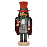 From the classic German story, the Nutcracker and the Mouse King, comes Uncle Drosselmeier. This hand carved Christian Ulbricht Nutcracker is a piece of Holzkunst. He is wearing his trademark eyepatch, a large red top hat, a long grey coat with black buttons and his gold watch and chain. Over his coat he is wearing a black cape. He is carrying a black cane topped with a golden circular handle and a mini soldier style nutcracker as a gift.