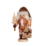Natural Santa Claus nutcracker, holding a miniature tree, and a bag of gifts.