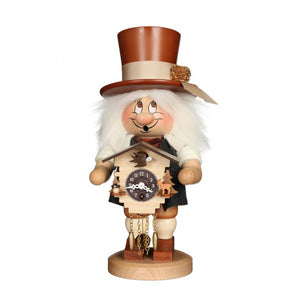 Dwarf smoker, dressed in Black Forest attire, holding a miniature cuckoo clock in his hands.