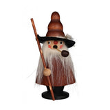 Gnome smoker, with a pipe and holding a walking stick.