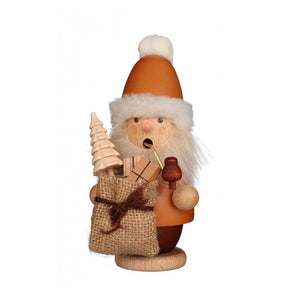 Small Santa Claus smoker in natural colors, with a pipe and holding a bag of gifts and toys.