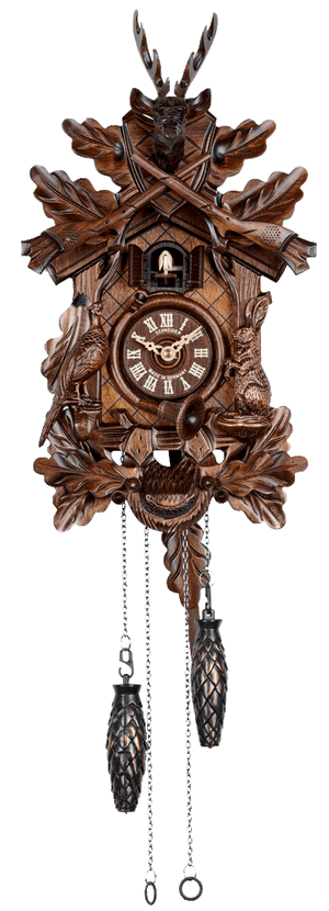 Quartz Schneider Traditional coocoo clock. A rabbit sitting on his hind legs is on the right, a pheasant looking up is on the left. Oak leaves decorate the crosshatched front of the clock. A horn encircles the dial and a hunter’s pouch decorates the bottom. The cuckoo comes out from his door above the dial. There are crossed rifles above the cuckoo and above them a stag head with antlers.